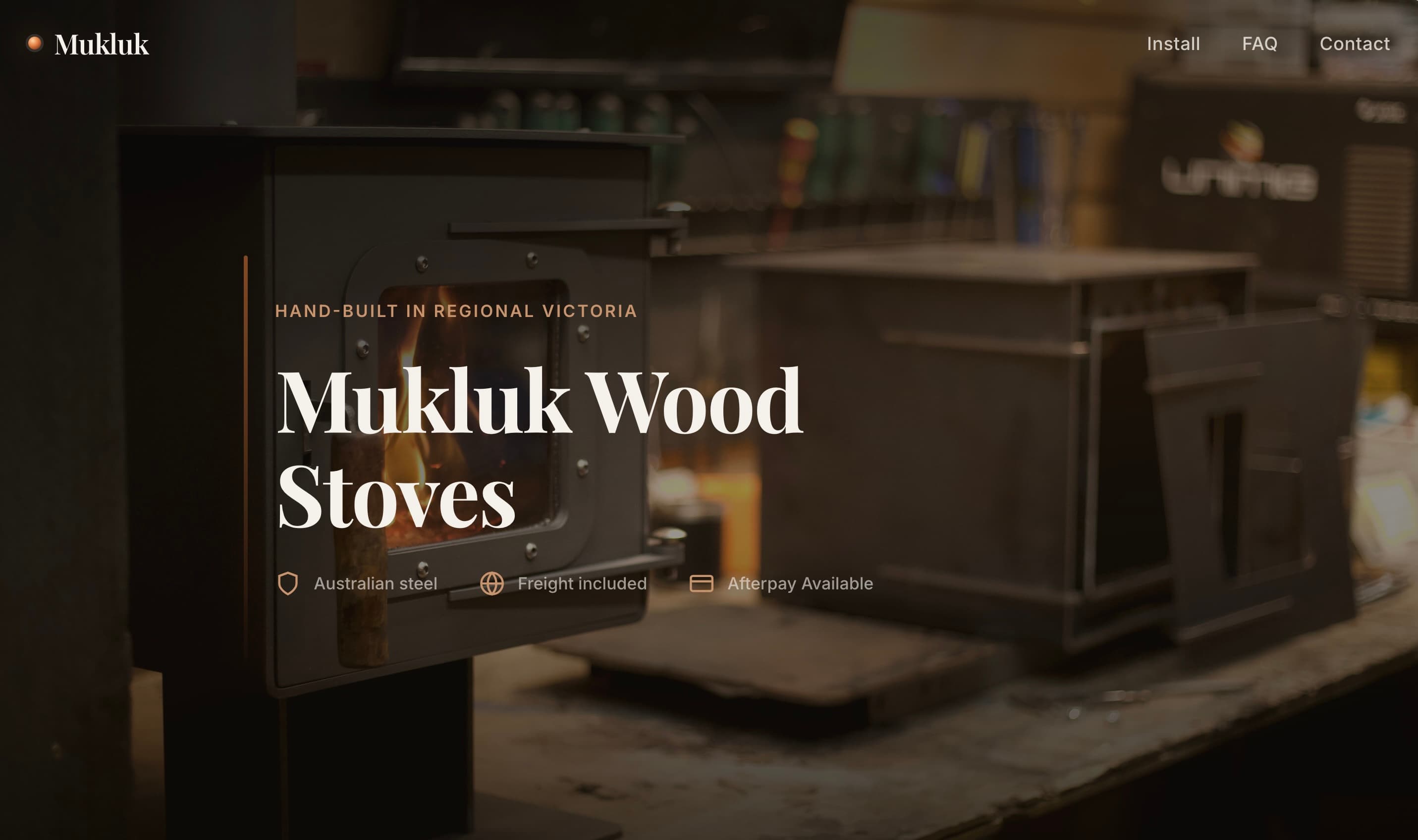 Screenshot of Mukluk Wood Stoves homepage showing a wood stove in a regional Victoria workshop